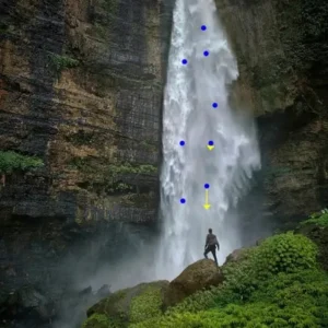 A person is holding a smartphone with Photo Motion app interface.