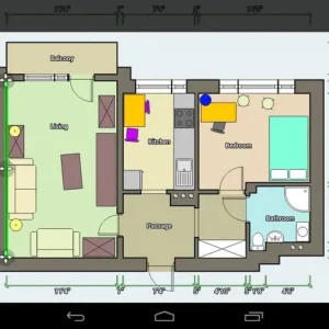 A person using a tablet to design a floor plan using the Floor Plan Creator app.